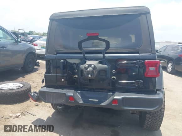 2019 Jeep Wrangler Sport S with VIN 1C4GJXAG0KW679915, listed as a IAAI auction lot 42420876 with 77,169 mi miles and . Bid and sale history available at DreamBid. Image 16.