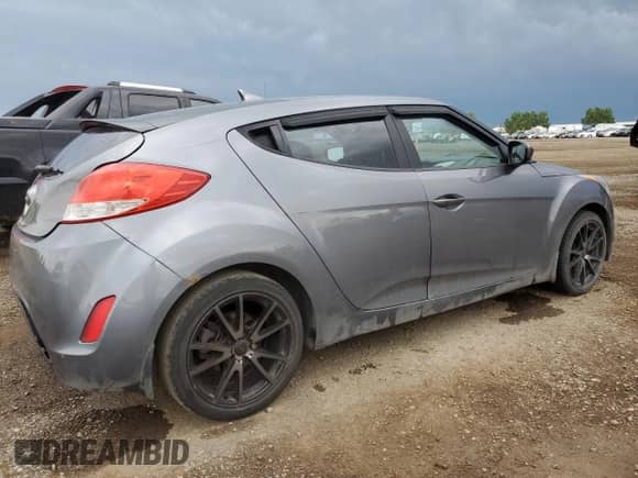 2012 Hyundai Veloster w/Red Int z VIN KMHTC6AD1CU037818, wystawiony jako Copart lot #69647765 z przebiegiem 305 408 mil mil oraz Szkoda całkowita • Salvage title. Historia ofert i sprzedaży dostępna na DreamBid. Obrazek 3.