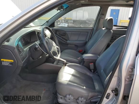 2004 Hyundai Elantra GT z VIN KMHDN56D84U130497, wystawiony jako Copart lot #49121055 z przebiegiem 96 046 mil mil oraz Szkoda całkowita • Salvage title. Historia ofert i sprzedaży dostępna na DreamBid. Obrazek 7.