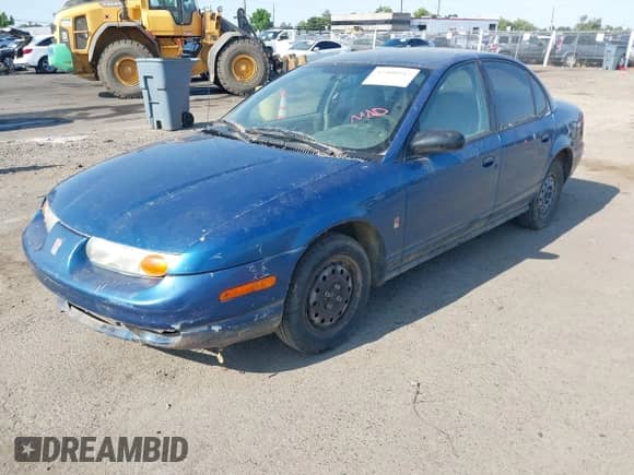 2002 Saturn SL with VIN 1G8ZG52832Z141611, listed as a IAAI auction lot 42409942 with Not provided miles and . Bid and sale history available at DreamBid. Image 2.
