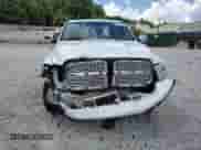 2014 Ram 1500 Laramie z VIN 1C6RR6NT7ES221844, wystawiony jako Copart lot #61636015 z przebiegiem 226 962 mil mil oraz Szkoda całkowita • Salvage title. Historia ofert i sprzedaży dostępna na DreamBid. Obrazek 5.