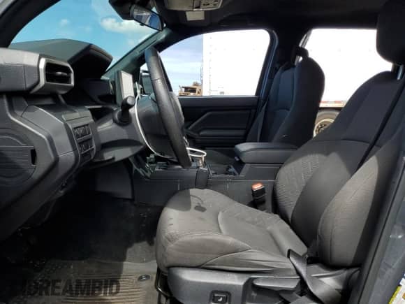 2024 Toyota Tacoma SR with VIN 3TYKD5HN7RT003129, listed as a Copart auction lot 63349125 with 15,244 mi miles and Salvage title. Bid and sale history available at DreamBid. Image 7.