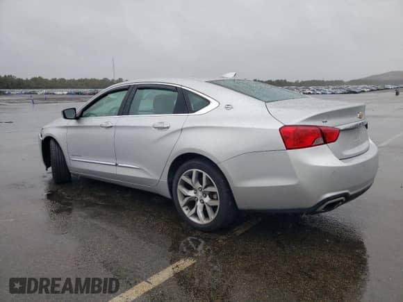 2018 Chevrolet Impala Premier z VIN 2G1125S35J9150253, wystawiony jako Copart lot #82458955 z przebiegiem 111 064 mil mil oraz Szkoda całkowita • Salvage title. Historia ofert i sprzedaży dostępna na DreamBid. Obrazek 2.