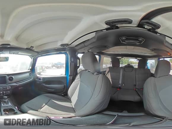 2023 Jeep Wrangler Sport S with VIN 1C4HJXDG7PW677814, listed as a Copart auction lot 67802085 with 28,546 mi miles and Salvage title. Bid and sale history available at DreamBid. Image 15.