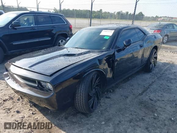 2014 Dodge Challenger R/T с VIN 2C3CDYBT8EH154065, выставлен на аукционе IAAI как лот 39864526 с пробегом 130 851 миль миль и . История ставок и продаж доступна на DreamBid. Изображение 2.
