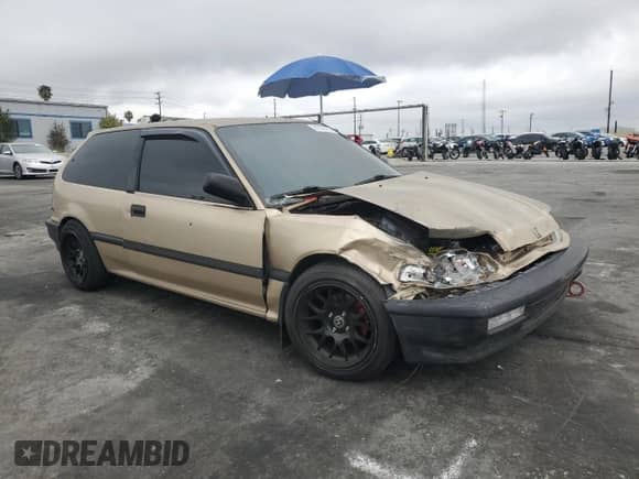 1990 Honda Civic with VIN 2HGED6343LH555344, listed as a Copart auction lot 51232765 with 217,533 mi miles and Salvage title. Bid and sale history available at DreamBid. Image 4.