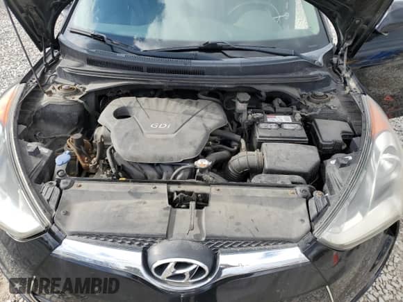 2013 Hyundai Veloster w/Black Int z VIN KMHTC6AD7DU138072, wystawiony jako Copart lot #90821765 z przebiegiem 123 633 mil mil oraz Czysty tytuł • Clean title. Historia ofert i sprzedaży dostępna na DreamBid. Obrazek 11.