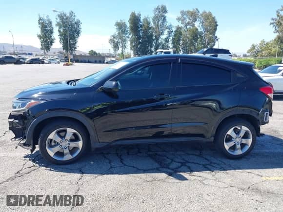 2021 Honda HR-V LX with VIN 3CZRU6H30MM739590, listed as a IAAI auction lot 43029474 with 74,490 mi miles and . Bid and sale history available at DreamBid. Image 15.