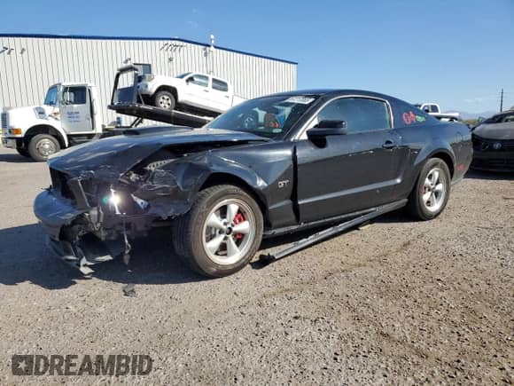 2007 Ford Mustang GT Deluxe с VIN 1ZVFT82H275259800, выставлен на аукционе Copart как лот 87217065 с пробегом 162 172 миль миль и Списание • Salvage title. История ставок и продаж доступна на DreamBid. Изображение 1.