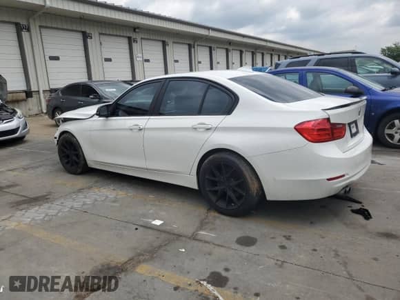 2014 BMW 3 Series 328i with VIN WBA3C1C55EK106910, listed as a Copart auction lot 65017595 with 124,408 mi miles and Salvage title. Bid and sale history available at DreamBid. Image 2.