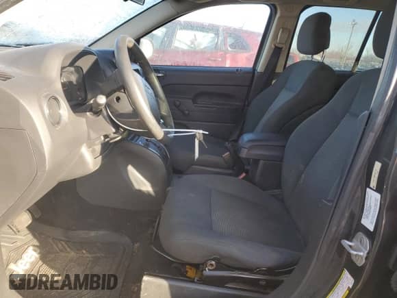 2010 Jeep Compass Sport z VIN 1J4NT1FB8AD671108, wystawiony jako Copart lot #82151454 z przebiegiem 206 413 mil mil oraz Szkoda całkowita • Salvage title. Historia ofert i sprzedaży dostępna na DreamBid. Obrazek 7.
