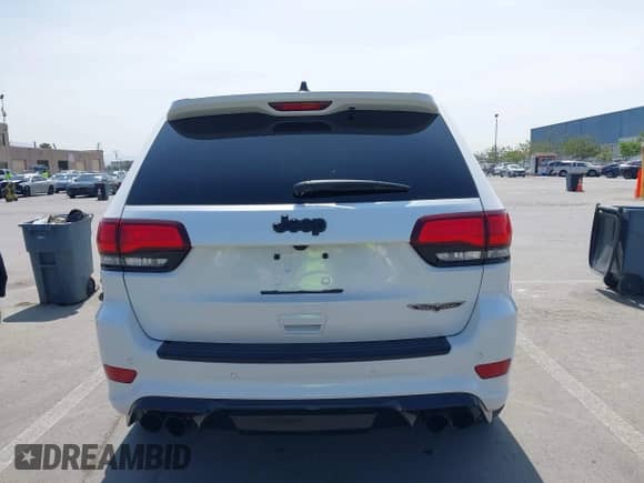 2018 Jeep Grand Cherokee Trackhawk with VIN 1C4RJFN97JC199045, listed as a IAAI auction lot 42169426 with 17,140 mi miles and . Bid and sale history available at DreamBid. Image 16.