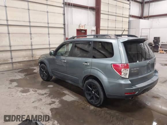 2009 Subaru Forester XT Limited with VIN JF2SH66609H763068, listed as a IAAI auction lot 42221733 with 210,159 mi miles and . Bid and sale history available at DreamBid. Image 3.
