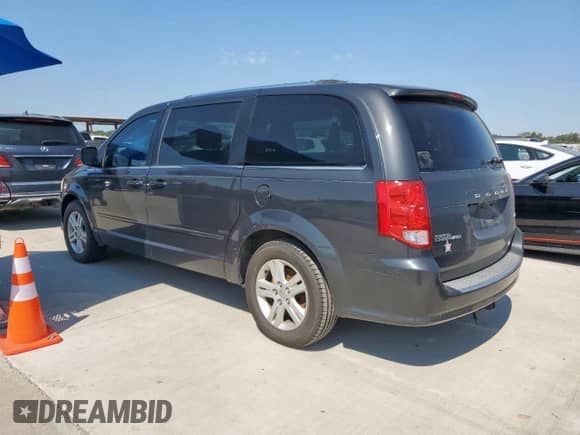 2012 Dodge Grand Caravan Crew with VIN 2C4RDGDG2CR104253, listed as a Copart auction lot 71555665 with 187,420 mi miles and Clean title. Bid and sale history available at DreamBid. Image 2.