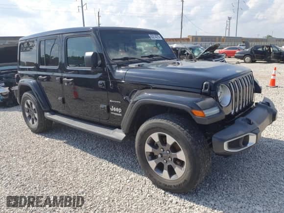2021 Jeep Wrangler Unlimited Sahara Altitude with VIN 1C4HJXEG1MW605811, listed as a Copart auction lot 63214275 with 81,473 mi miles and Salvage title. Bid and sale history available at DreamBid. Image 4.