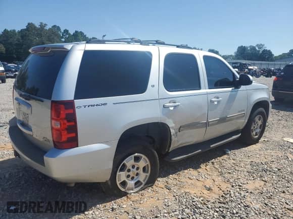 2014 Chevrolet Tahoe LT with VIN 1GNSCBE03ER212227, listed as a Copart auction lot 66442275 with 180,881 mi miles and Salvage title. Bid and sale history available at DreamBid. Image 3.