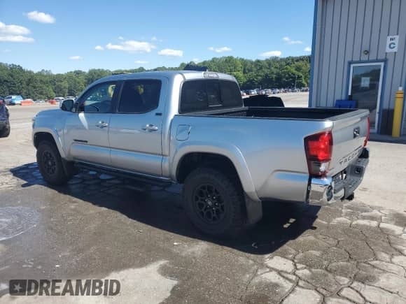 2022 Toyota Tacoma SR5 with VIN 3TMAZ5CN3NM192341, listed as a Copart auction lot 71441435 with 52,057 mi miles and Salvage title. Bid and sale history available at DreamBid. Image 2.