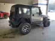 2000 Jeep Wrangler Sport with VIN 1J4FA49S2YP710100, listed as a Copart auction lot 85668155 with Not provided miles and Clean title. Bid and sale history available at DreamBid. Image 3.