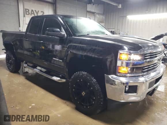 2018 Chevrolet Silverado 2500HD LT with VIN 1GC2KVEG1JZ110607, listed as a Copart auction lot 84942914 with 101,560 mi miles and Salvage title. Bid and sale history available at DreamBid. Image 4.