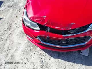 2016 Chevrolet Cruze LS z VIN 1G1BC5SM1G7286884, wystawiony jako IAAI lot #43118368 z przebiegiem 185 856 mil mil oraz . Historia ofert i sprzedaży dostępna na DreamBid. Obrazek 6.