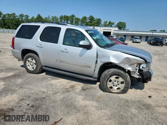 2012 Chevrolet Tahoe LT with VIN 1GNSCBE09CR168490, listed as a Copart auction lot 63392915 with 245,669 mi miles and Salvage title. Bid and sale history available at DreamBid. Image 4.