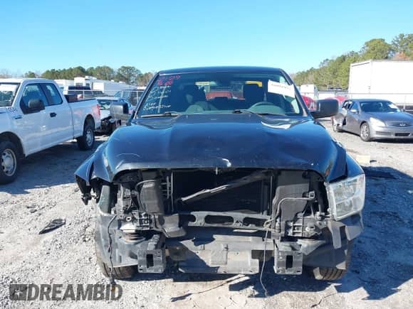 2018 Ram 1500 Tradesman z VIN 1C6RR6KG1JS259345, wystawiony jako IAAI lot #41091977 z przebiegiem 117 521 mil mil oraz . Historia ofert i sprzedaży dostępna na DreamBid. Obrazek 6.