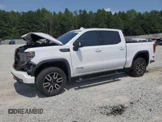2023 GMC Sierra 1500 AT4 with VIN 3GTUUEEL8PG112914, listed as a Copart auction lot 59000335 with 83,741 mi miles and Salvage title. Bid and sale history available at DreamBid. Image 1.