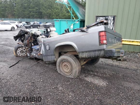 1990 Dodge Dakota z VIN 1B7FL23X7LS730129, wystawiony jako Copart lot #87757725 z przebiegiem Nie podano mil oraz Nie do naprawy • Non repairable. Historia ofert i sprzedaży dostępna na DreamBid. Obrazek 2.