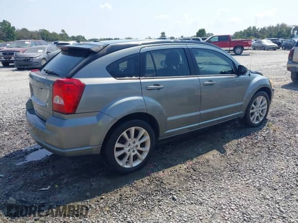 2011 Dodge Caliber Heat with VIN 1B3CB5HA4BD256852, listed as a IAAI auction lot 43264617 with 201,409 mi miles and . Bid and sale history available at DreamBid. Image 4.