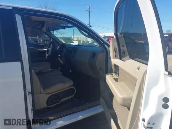 2005 Ford F-150 STX with VIN 1FTRX12W05FA94542, listed as a IAAI auction lot 43499378 with 311,528 mi miles and . Bid and sale history available at DreamBid. Image 5.