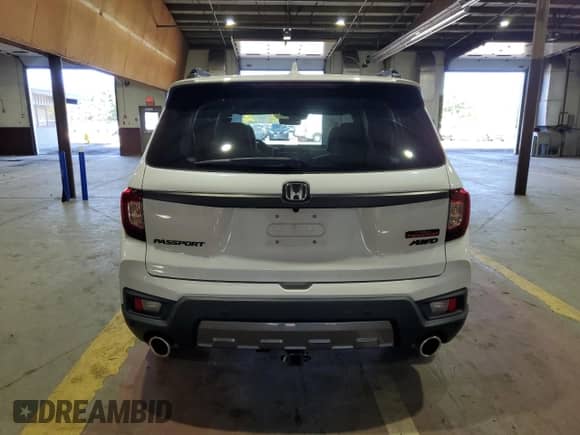 2022 Honda Passport TrailSport with VIN 5FNYF8H65NB013425, listed as a Copart auction lot 84797005 with 35,155 mi miles and Salvage title. Bid and sale history available at DreamBid. Image 6.