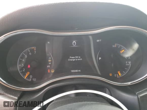 2014 Jeep Grand Cherokee Laredo with VIN 1C4RJEAG4EC207784, listed as a Copart auction lot 81490235 with 165,048 mi miles and Salvage title. Bid and sale history available at DreamBid. Image 9.