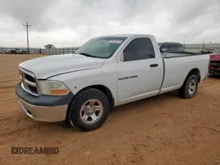 2012 Ram 1500 ST z VIN 3C6JD6DP3CG136360, wystawiony jako Copart lot #62033915 z przebiegiem 159 430 mil mil oraz Czysty tytuł • Clean title. Historia ofert i sprzedaży dostępna na DreamBid. Obrazek 1.
