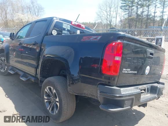 2021 Chevrolet Colorado 4WD Z71 z VIN 1GCGTDEN9M1156622, wystawiony jako IAAI lot #42065075 z przebiegiem 61 438 mil mil oraz . Historia ofert i sprzedaży dostępna na DreamBid. Obrazek 3.