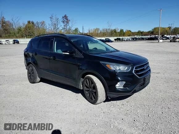 2017 Ford Escape Titanium с VIN 1FMCU9JD2HUD17267, выставлен на аукционе Copart как лот 86828485 с пробегом 72 989 миль миль и Списание • Salvage title. История ставок и продаж доступна на DreamBid. Изображение 14.