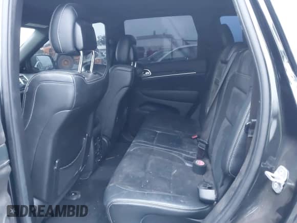 2014 Jeep Grand Cherokee SRT-8 z VIN 1C4RJFDJ9EC347505, wystawiony jako IAAI lot #41896248 z przebiegiem 59 049 mil mil oraz . Historia ofert i sprzedaży dostępna na DreamBid. Obrazek 8.