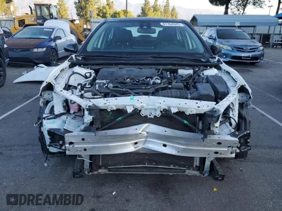 2023 Toyota Camry Hybrid XSE с VIN 4T1K31AK5PU050459, выставлен на аукционе Copart как лот 81764945 с пробегом 42 571 миль миль и Списание • Salvage title. История ставок и продаж доступна на DreamBid. Изображение 5.