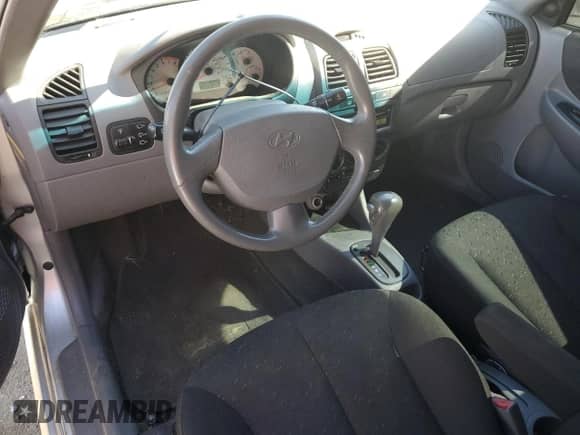 2005 Hyundai Accent GLS с VIN KMHCG35C05U331928, выставлен на аукционе Copart как лот 74672614 с пробегом 41 542 миль миль и Списание • Salvage title. История ставок и продаж доступна на DreamBid. Изображение 8.