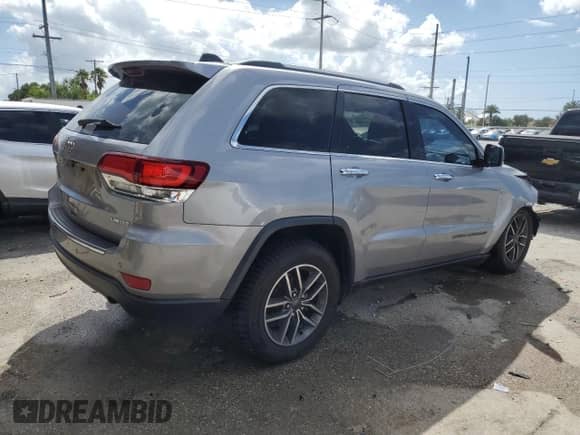 2020 Jeep Grand Cherokee Limited with VIN 1C4RJEBG0LC128138, listed as a Copart auction lot 85332895 with 132,587 mi miles and Salvage title. Bid and sale history available at DreamBid. Image 3.