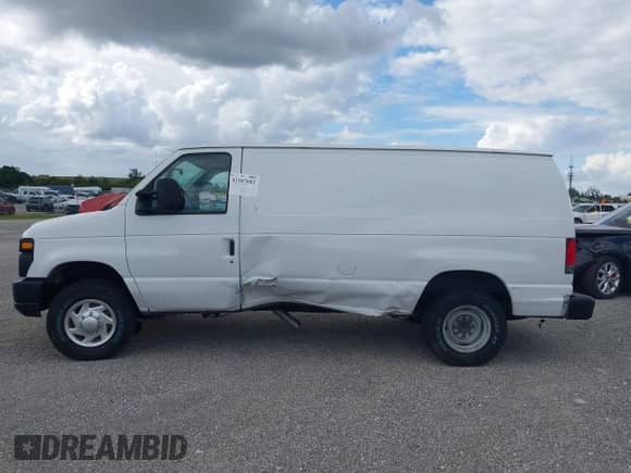 2013 Ford Econoline Cargo Commercial with VIN 1FTNE2EW1DDB21585, listed as a IAAI auction lot 42107682 with 266,895 mi miles and . Bid and sale history available at DreamBid. Image 14.
