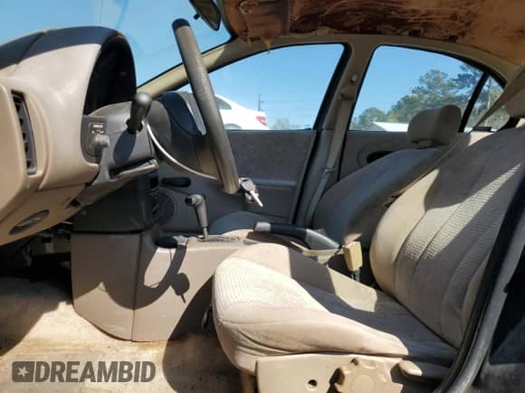 1999 Saturn SL z VIN 1G8ZK527XXZ111390, wystawiony jako Copart lot #49042185 z przebiegiem 164 733 mil mil oraz Szkoda całkowita • Salvage title. Historia ofert i sprzedaży dostępna na DreamBid. Obrazek 7.