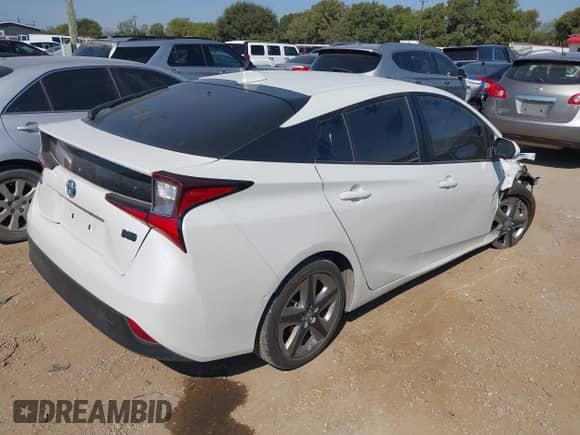 2021 Toyota Prius Limited with VIN JTDKAMFU9M3130578, listed as a IAAI auction lot 43236398 with 258,496 mi miles and . Bid and sale history available at DreamBid. Image 4.