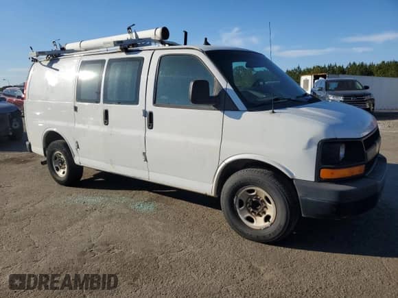 2013 Chevrolet Express Cargo z VIN 1GCWGFCA2D1904090, wystawiony jako Copart lot #70963255 z przebiegiem 202 935 mil mil oraz Czysty tytuł • Clean title. Historia ofert i sprzedaży dostępna na DreamBid. Obrazek 4.