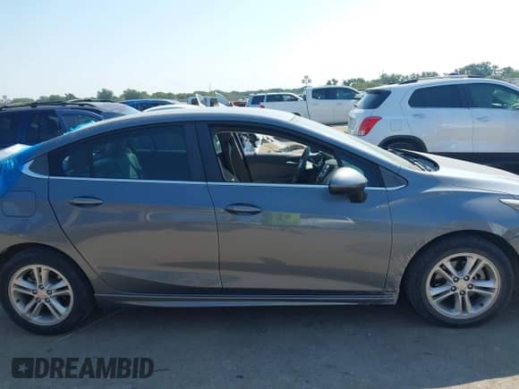 2018 Chevrolet Cruze LT with VIN 1G1BE5SM8J7155517, listed as a IAAI auction lot 43233777 with 114,590 mi miles and . Bid and sale history available at DreamBid. Image 13.