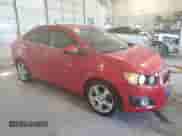 2013 Chevrolet Sonic LTZ с VIN 1G1JE5SG0D4164711, выставлен на аукционе Copart как лот 81845895 с пробегом 136 844 миль миль и Списание • Salvage title. История ставок и продаж доступна на DreamBid. Изображение 4.