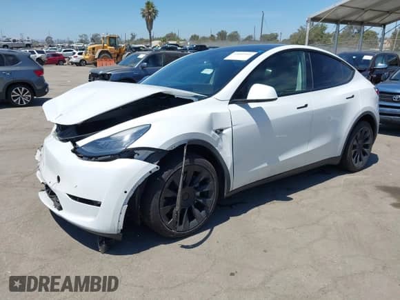 2022 Tesla Model Y Long Range z VIN 7SAYGDEE3NF413701, wystawiony jako IAAI lot #43045999 z przebiegiem 17 042 mil mil oraz . Historia ofert i sprzedaży dostępna na DreamBid. Obrazek 2.