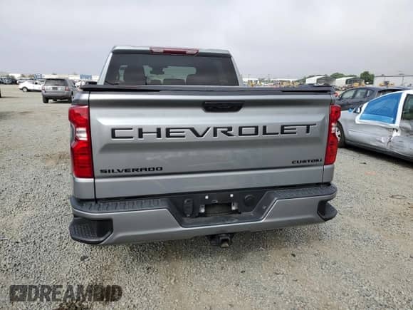 2024 Chevrolet Silverado 1500 Custom with VIN 3GCPABEK2RG394255, listed as a Copart auction lot 82154585 with 8,465 mi miles and Salvage title. Bid and sale history available at DreamBid. Image 6.