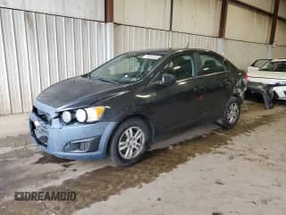 2014 Chevrolet Sonic LT with VIN 1G1JC5SG0E4209427, listed as a Copart auction lot 71691335 with 183,935 mi miles and Salvage title. Bid and sale history available at DreamBid. Image 1.