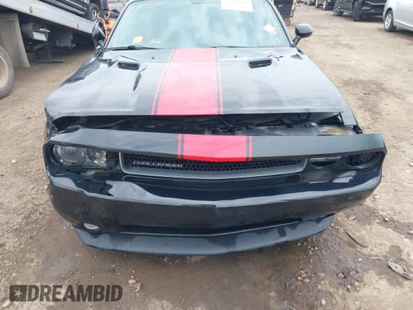 2013 Dodge Challenger SXT with VIN 2C3CDYAG1DH581784, listed as a IAAI auction lot 42263476 with 107,341 mi miles and . Bid and sale history available at DreamBid. Image 6.