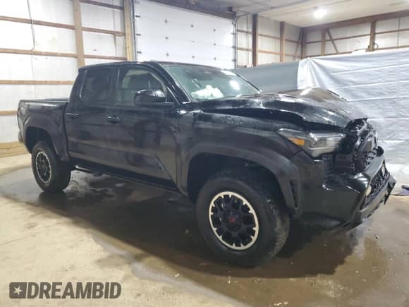 2024 Toyota Tacoma TRD Off Road with VIN 3TMLB5JN8RM005102, listed as a Copart auction lot 89516175 with 22,558 mi miles and Salvage title. Bid and sale history available at DreamBid. Image 4.